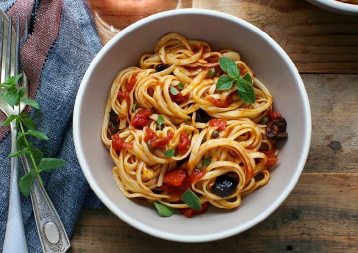 https://cooking.nytimes.com/recipes/11583-pasta-puttanesca | NYTimes