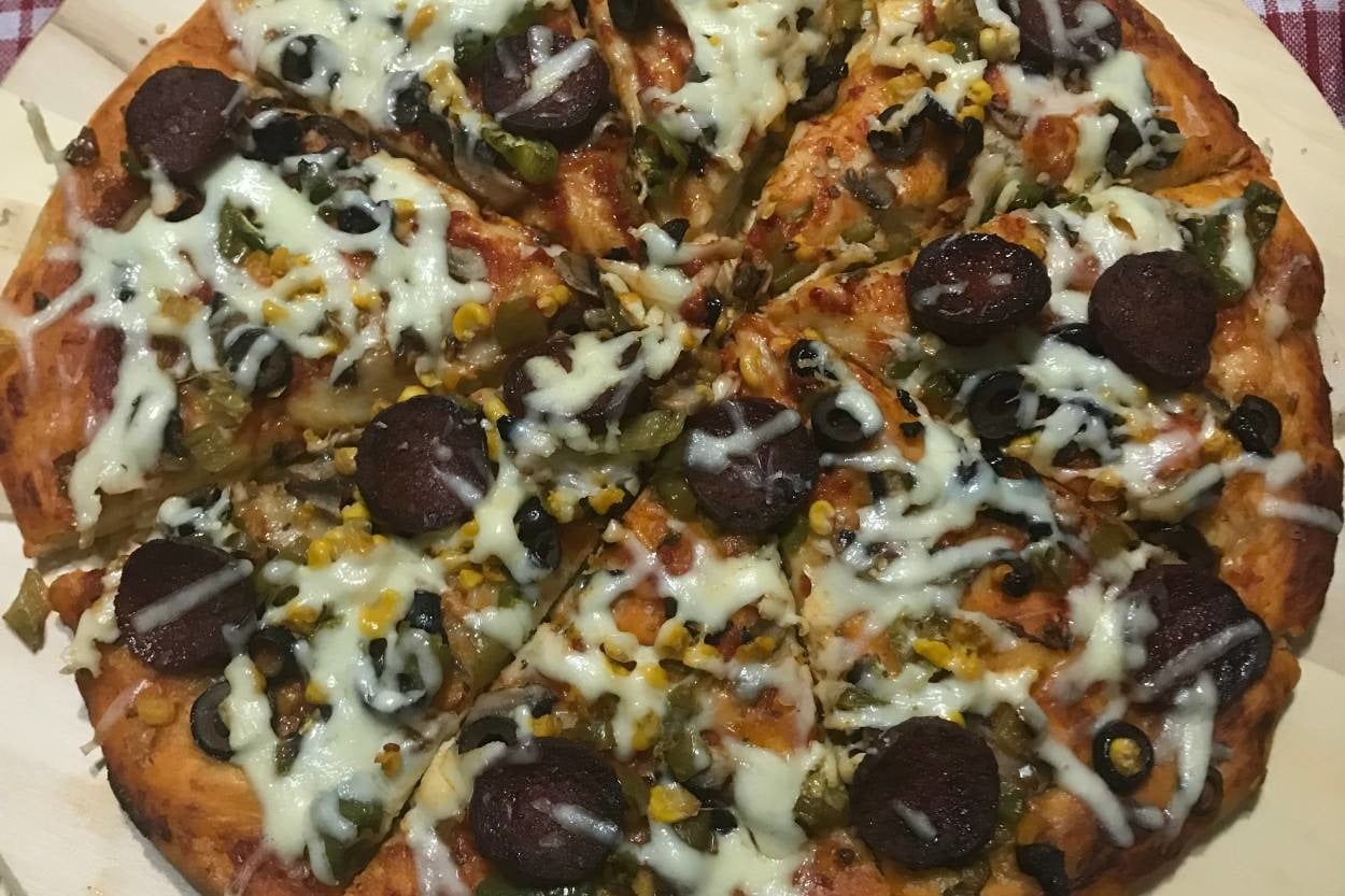 Enfes Hamuruyla: Ev Yapımı Pizza